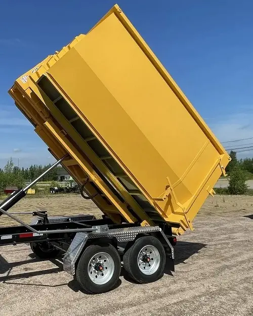 Auburndale roll-off dumpster tilts into delivery position on a raised trailer operated by RapidPolk Dumpster Rental