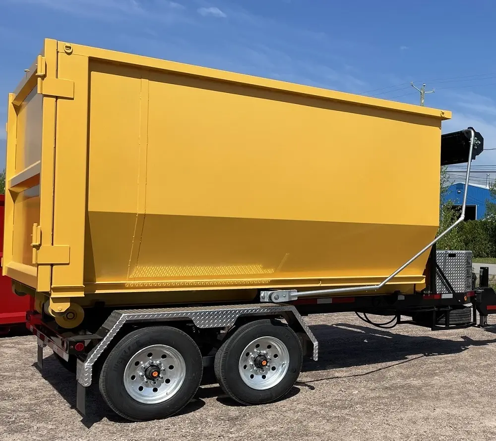 Auburndale roll-off dumpster sits secured on a dual-axle trailer prepared for rental service, captured by RapidPolk Dumpster Rental